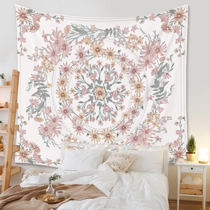 Close-up of bohemian floral mandala tapestry showing fabric texture and edge stitching