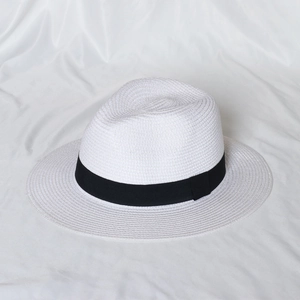 Classic white woven straw Fedora sun hat with wide black ribbon and textured finish