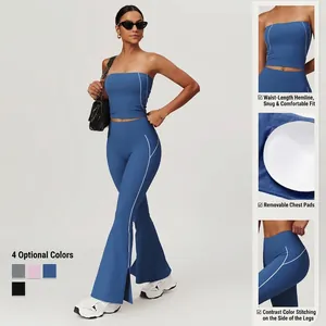 Blue yoga set with sports bra and flared high-waisted leggings featuring contrast stitching