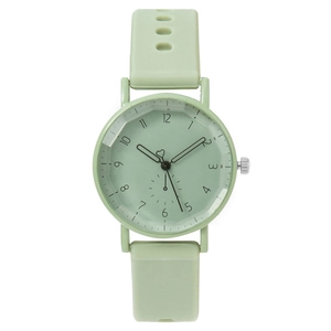 Pale green women's quartz watch with silicone strap and multi-faceted cut crystal dial