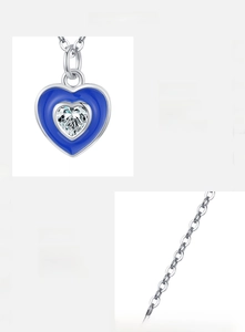 Macro shot of 925 silver necklace featuring a blue enamel heart with 5A zircon inlay