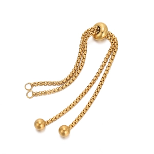 Macro shot of gold-plated stainless steel box chain with adjustable sliding bead and ball ends