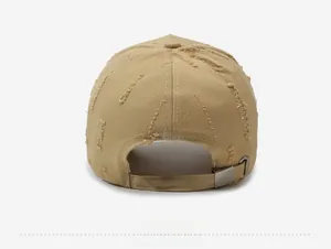 Rear view of khaki distressed baseball cap featuring adjustable metal buckle and torn fabric