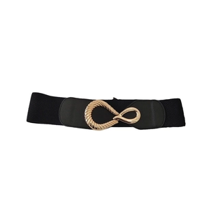 Elastic black waist belt featuring a vintage gold twisted oval buckle for women dresses