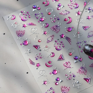 3D embossed nail stickers featuring gradient pink celestial stars and moon patterns