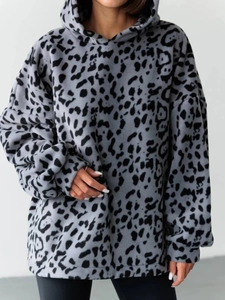 Detail of grey leopard print oversized hoodie with soft fleece texture and drop shoulders