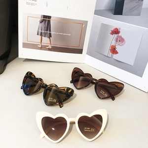 Kids heart shaped sunglasses with UV400 protection in tortoiseshell and white colors