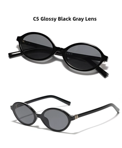 Detailed macro view of vintage oval sunglasses frame with gold accents and CE logo