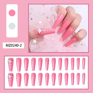 Detail of pink long coffin press-on nails with rhinestones and plain matte finish