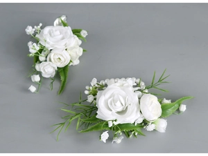 Detail view of artificial white rose corsage and wristlet set with pearl elastic band