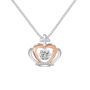 Detail of clover necklace featuring crown cross heart pendant and rose gold accents