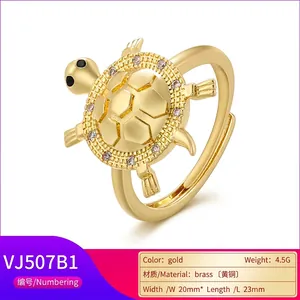 Adjustable golden brass turtle ring with sparkling crystal shell details for women