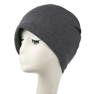 Deep grey knitted beanie on a white mannequin head for a minimalist autumn winter style