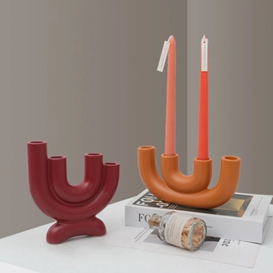 Nordic U-shaped ceramic candle holder with modern wave design in matte red and orange