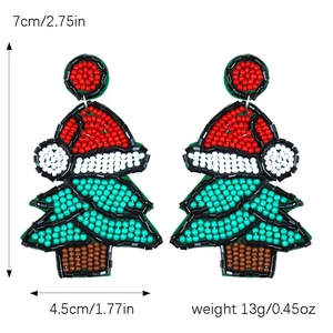 Detailed view of handmade beaded Christmas tree earrings with size and weight dimensions