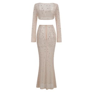 Detail view of the back zipper and rhinestone mesh fabric on a two-piece skirt set