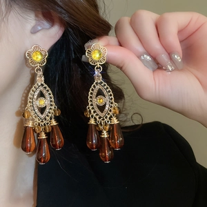 Vintage-Schlangenohrringe mit bernsteinfarbenen Kristallen und goldenen Details