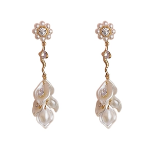 Elegant gold flower pearl earrings with long tassels and sparkling zircon stones
