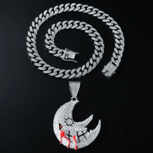 Hip hop moon pendant necklace with iced out crystals, red drip details, and cuban chain
