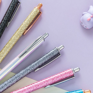 Set of six shimmering glitter metal click pens in various colors for creative gifting