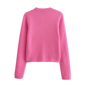 Back view of bright pink long-sleeved knit cardigan with a slim fit and round neck