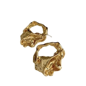 Minimalist golden irregular geometric earrings with molten lava texture and metallic finish