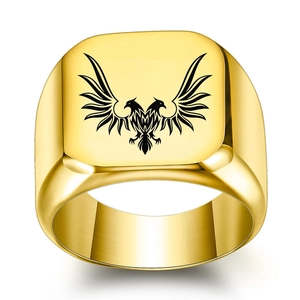 Polished gold stainless steel signet ring for men featuring a black double-headed eagle
