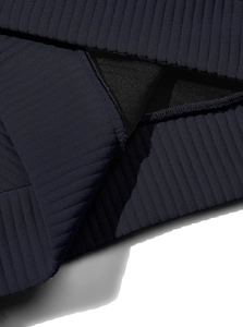 Macro shot of navy corduroy fabric texture and high-density ribbed stitching detail