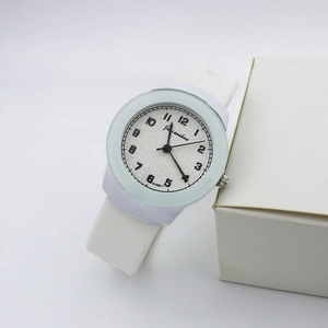 Minimalist white fashion quartz watch with silicone strap and clear black numerals