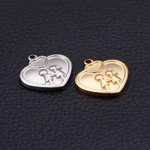 Golden and silver heart-shaped pendants with embossed figures on black leather background