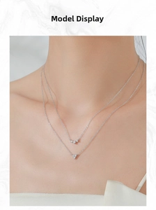 Double layer S925 silver necklace with heart pendant and round zircon accents on model