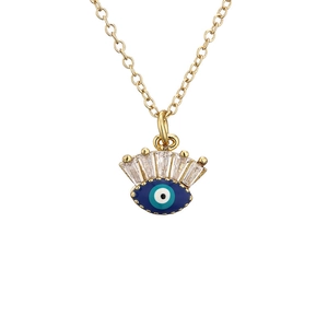 Golden evil eye pendant necklace with blue enamel and micro-set zircons on white background