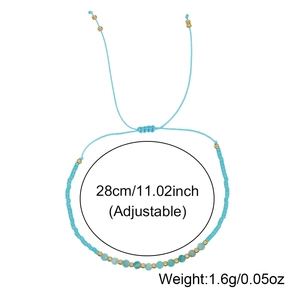 Adjustable blue beaded bracelet with semi-precious stones and gold accents, 28cm length