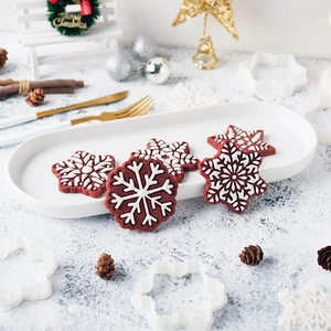 3D snowflake cookie cutters set for Christmas baking with red velvet cookies