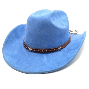 Macro view of light blue suede cowboy hat with studded brown leather band and star rivets