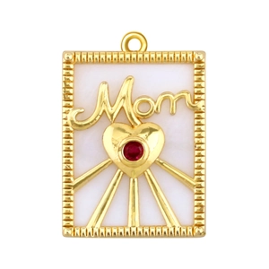 Detail of a rectangular gold Mom pendant with a red gemstone heart and sunburst rays
