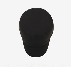 Top down view of black wool winter military cap for elderly men with thick texture