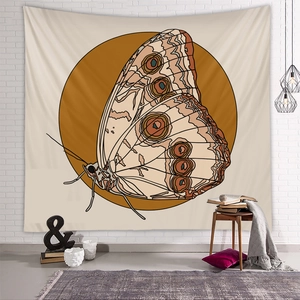 Close-up of minimalist butterfly wall tapestry on white brick wall in cozy room