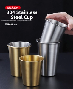 Close-up of SUS304 stainless steel cup showing brushed metal texture and golden finish