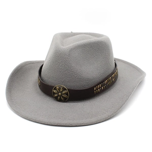 Close-up of grey felt cowboy hat featuring brown leather band with vintage metal studs