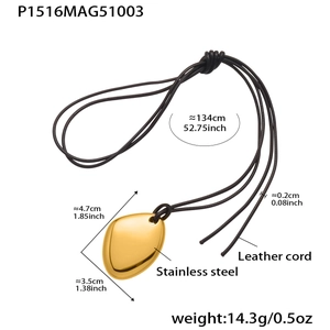 Detail view of large gold heart pendant with leather cord and full product dimensions