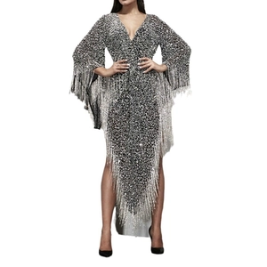 Detailed view of silver-black sequins and fringe on a deep V-neck evening dress