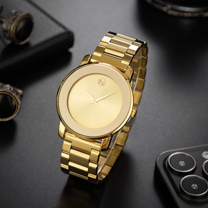 Classic ultra-thin gold business watch for men with minimalist dial on a black surface
