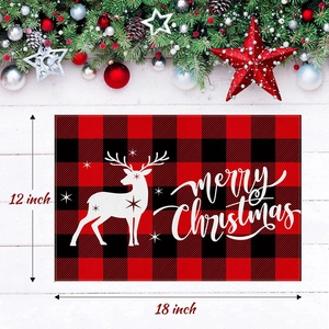 Detailed view of the 18x12 inch red and black buffalo plaid Christmas reindeer placemat