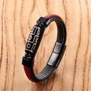 Ethnic nine-eyed dZi bead bracelet with red woven leather and black magnetic clasp