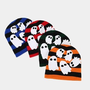 Close-up of knit texture on colorful Halloween ghost striped beanies for autumn