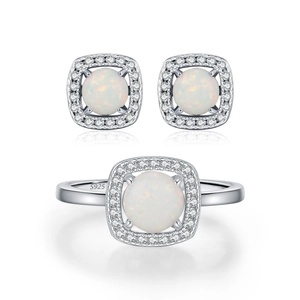 Elegant S925 sterling silver jewelry set featuring opal ring and matching earrings