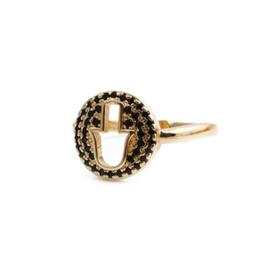 Detail of gold Hamsa Hand ring featuring concentric circles of black micro-pave zircons