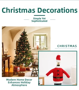 Detailed view of red knitted Santa sweater wine bottle cover with hat for Xmas decor