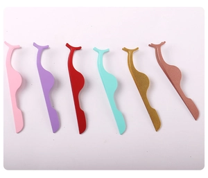 Set of 6 stainless steel eyelash tweezers in various macaron colors on white background